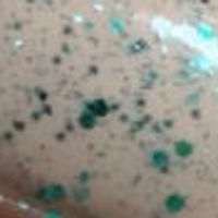 Nail polish swatch of shade China Glaze Pine-ing For Glitter