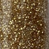 Nail polish swatch of shade Igel Antique Gold