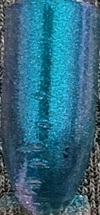 Nail polish swatch of shade Love and Beauty Blue-Green