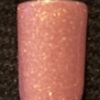 Nail polish swatch of shade Sparkle and Co. Pink Sunrise