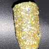 Nail polish swatch of shade Sparkle and Co. Pot o' gold