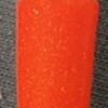 Nail polish swatch of shade Sparkle and Co. Marigold Motif
