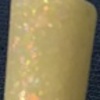 Nail polish swatch of shade Sparkle and Co. Ukulele Sunrise