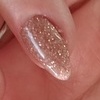 Nail polish swatch of shade Sparkle and Co. Rose Gold Fierce