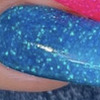 Nail polish swatch of shade Sparkle and Co. Glitterite