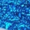 Nail polish swatch of shade Rogue Lacquer Delphinium out of water