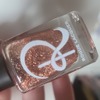 Nail polish swatch of shade Rogue Lacquer Copper topper