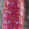 Nail polish swatch of shade Revel Pink Pineapple