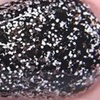 Nail polish swatch of shade Monarch Lacquer Panda-monium