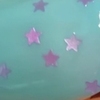 Nail polish swatch of shade Fancy Gloss Pink Mini Stars