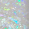 Nail polish swatch of shade Sparkle and Co. Clear with Flexie Flakies FF1