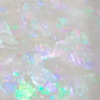 Nail polish swatch of shade Sparkle and Co. Clear with Flexie Flakies FF2