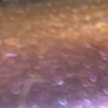 Nail polish swatch of shade Morovan Purple orange duochrome