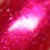 Nail polish swatch of shade Glisten and Glow Apple Steve Jobs